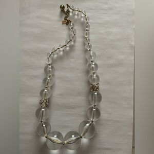 Kate Spade glass ball necklace featuring accent pieces